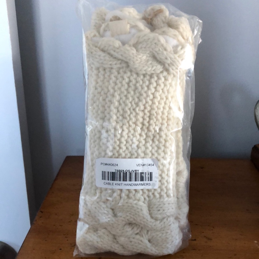 Women’s ivory colored hand warmers